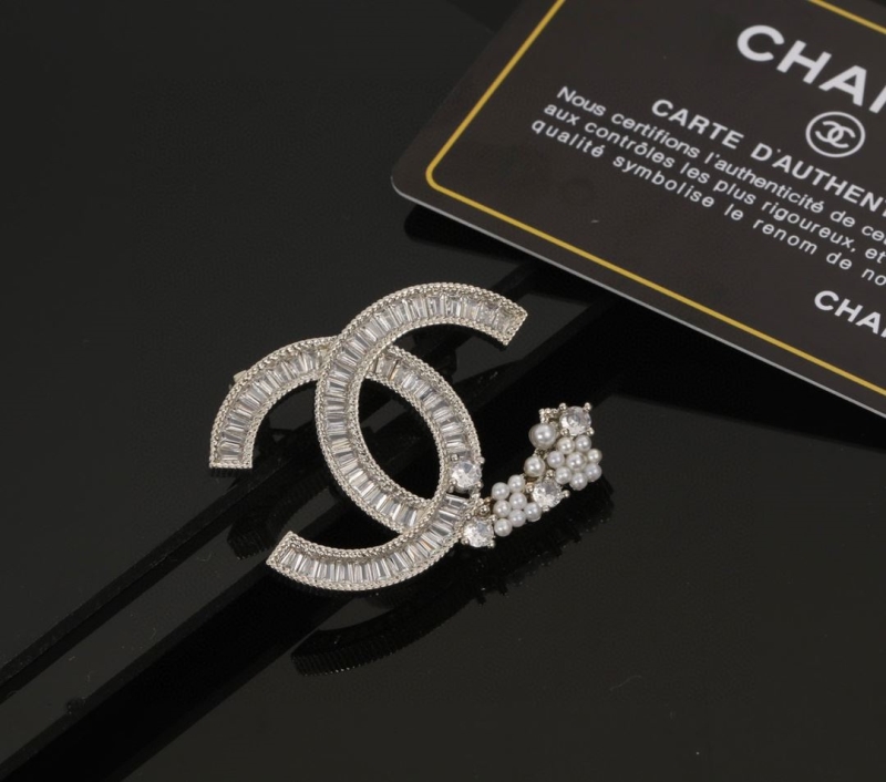 Ch**el brooches